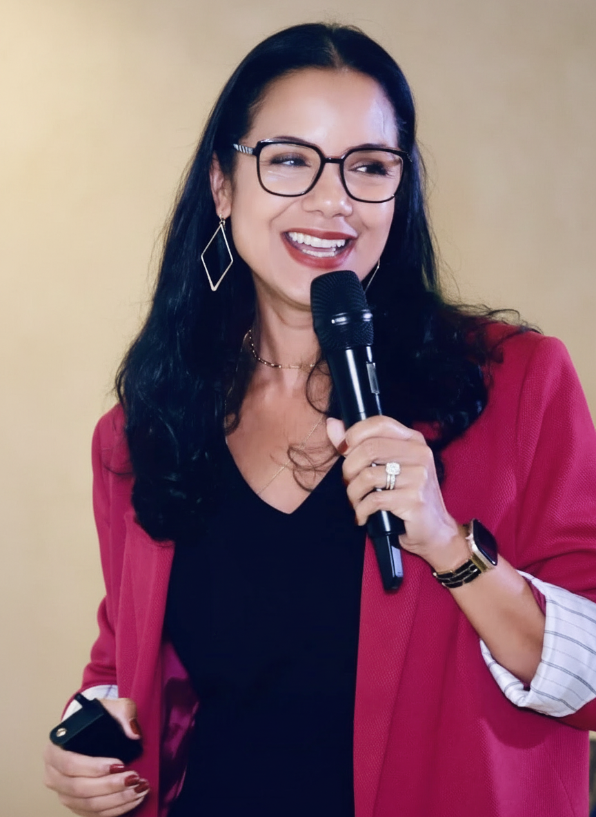 Clarissa M. Rodriguez speaking on stage
